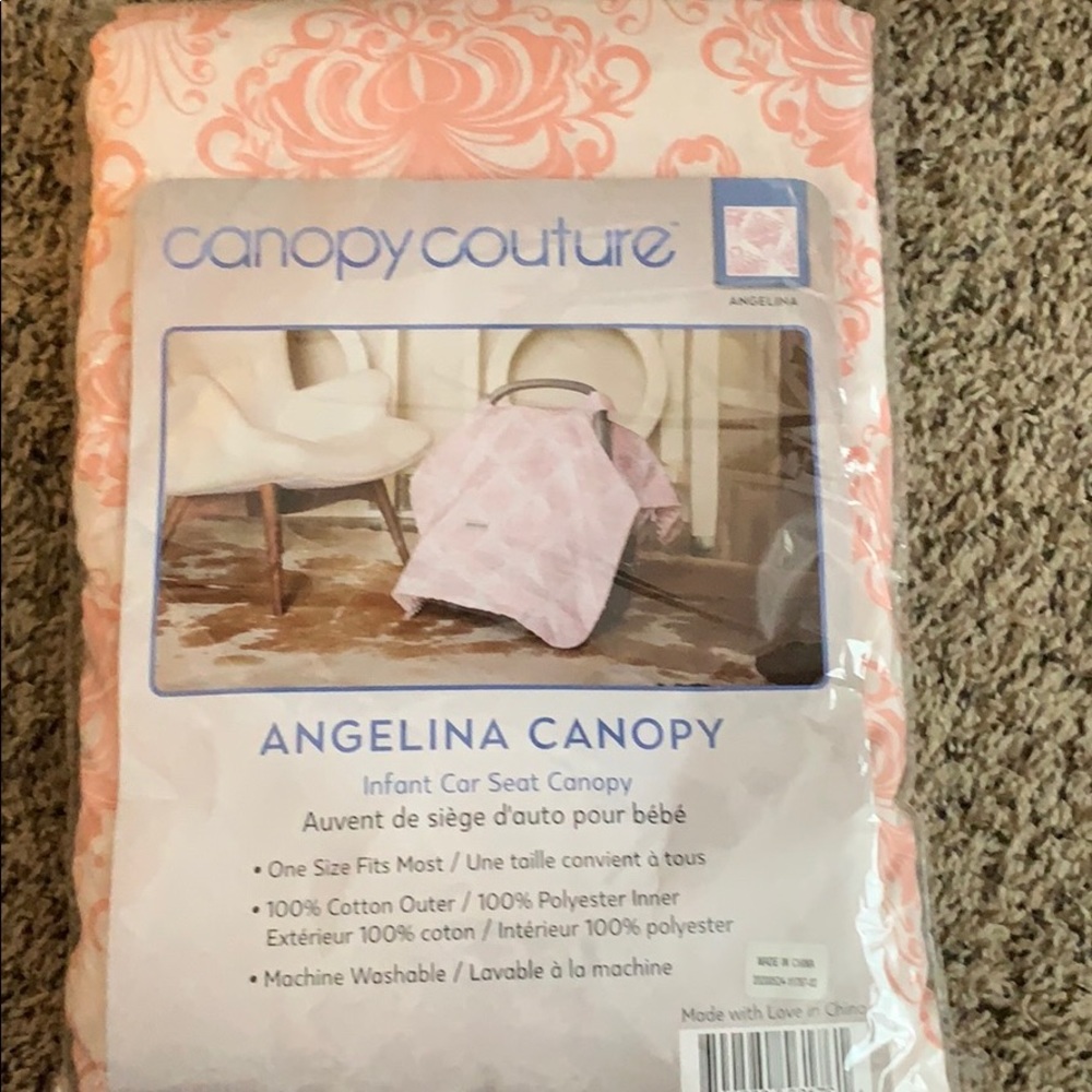New in package Canopy Couture car seat cover